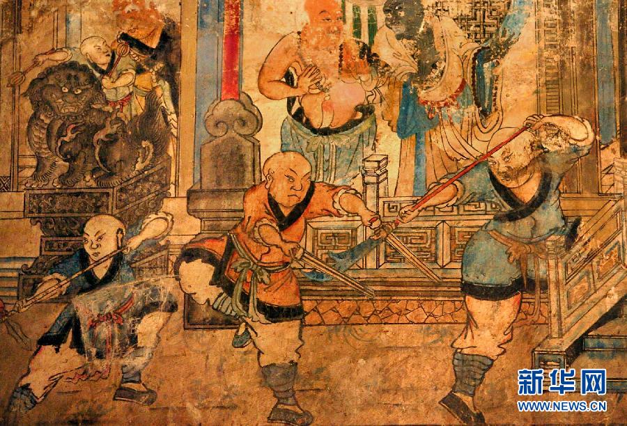 少林寺白衣殿內(nèi)的墻上表現(xiàn)少林武僧習(xí)武練拳的壁畫(huà)(局部,2005年9月15日攝)。