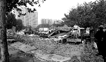 對(duì)公園選址的5.5萬(wàn)多平方米的違章建筑進(jìn)行拆除。